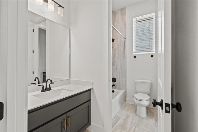 145 Lost Tree Dr, Buda, TX 78610 - full bathroom featuring vanity, toilet, bathtub / shower combination, and baseboards