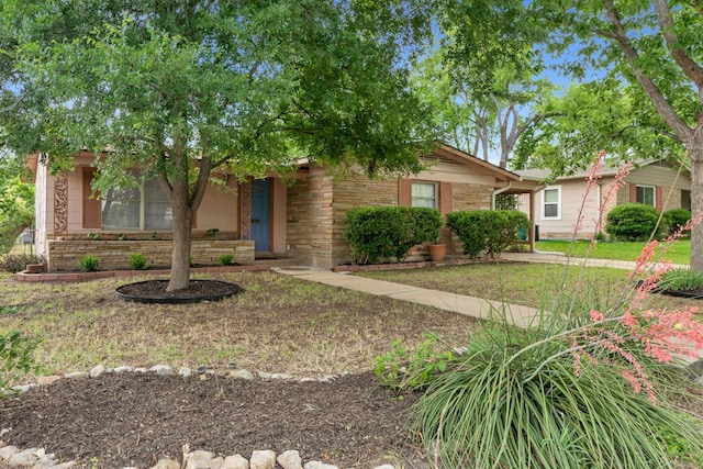1409 Briarcliff Blvd, Austin, TX 78723 - view of front of house featuring stone siding