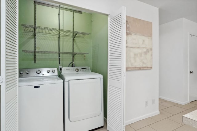 1409 Briarcliff Blvd, Austin, TX 78723 - laundry area featuring separate washer and dryer and baseboards