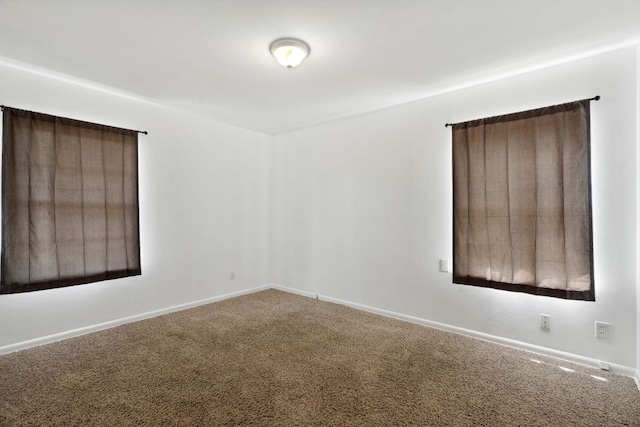 1409 Briarcliff Blvd, Austin, TX 78723 - carpeted empty room with baseboards