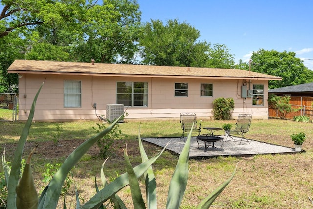 1409 Briarcliff Blvd, Austin, TX 78723 - rear view of house with a fire pit and a patio
