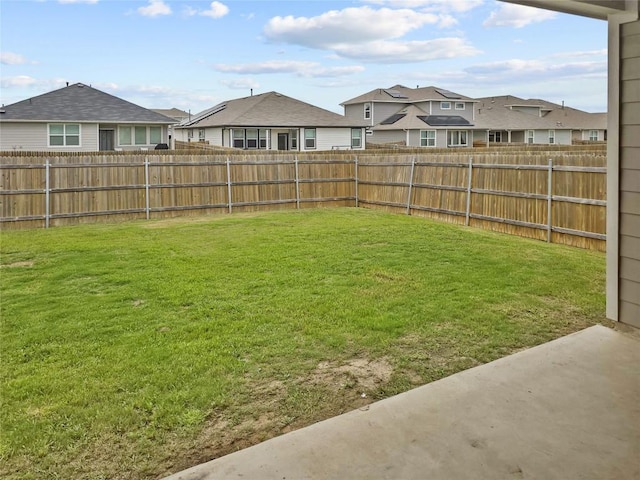 view of yard with a residential view