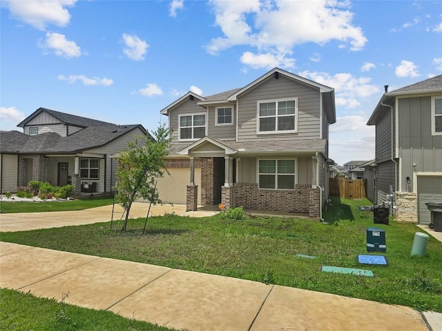 view of front facade featuring brick siding and concrete driveway