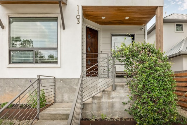 1103 12th St E, Austin, TX 78702 - view of exterior entry featuring stucco siding