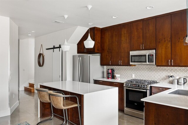 1103 12th St E, Austin, TX 78702 - kitchen featuring appliances with stainless steel finishes, backsplash, baseboards, recessed lighting, and light countertops