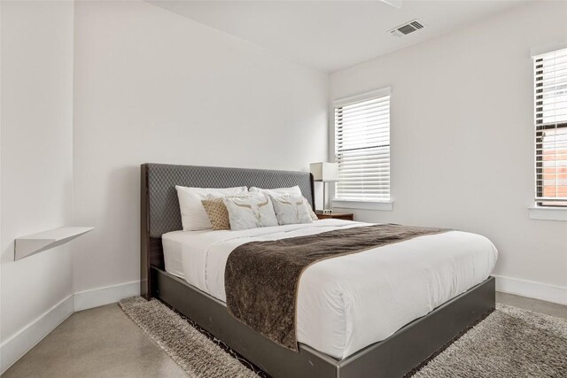1103 12th St E, Austin, TX 78702 - bedroom featuring baseboards and carpet