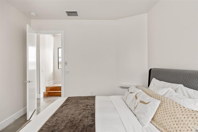 1103 12th St E, Austin, TX 78702 - bedroom featuring baseboards