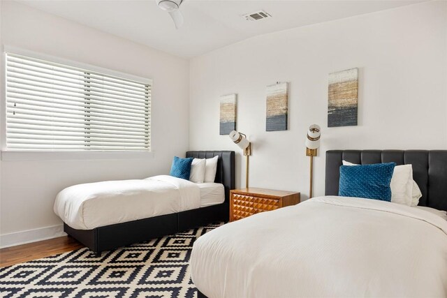 1103 12th St E, Austin, TX 78702 - bedroom with wood finished floors and baseboards