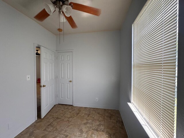 251 Zimmerman Ave A-B-C-D, Unit A-B-C-D, Bastrop, TX 78602 - spare room featuring a ceiling fan