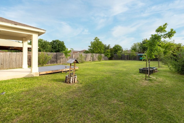 2306 Mccombs St, Georgetown, TX 78626 - view of yard featuring a deck