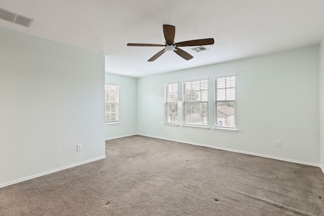2306 Mccombs St, Georgetown, TX 78626 - carpeted empty room with a ceiling fan and baseboards