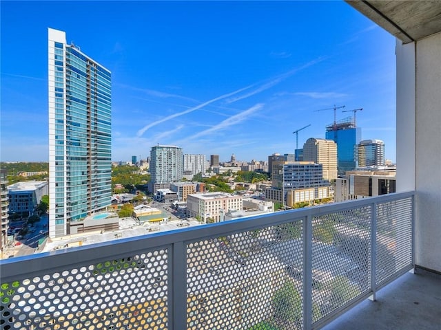 balcony featuring a view of city