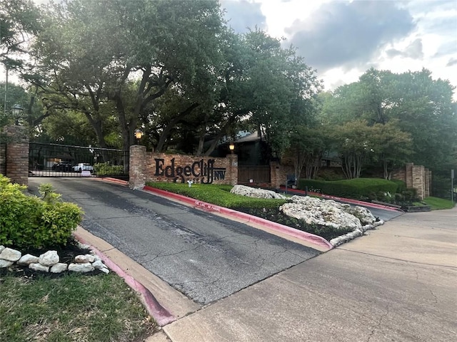 7122 Woodhollow Dr Unit 105, Austin, TX 78731 - community / neighborhood sign with a gate