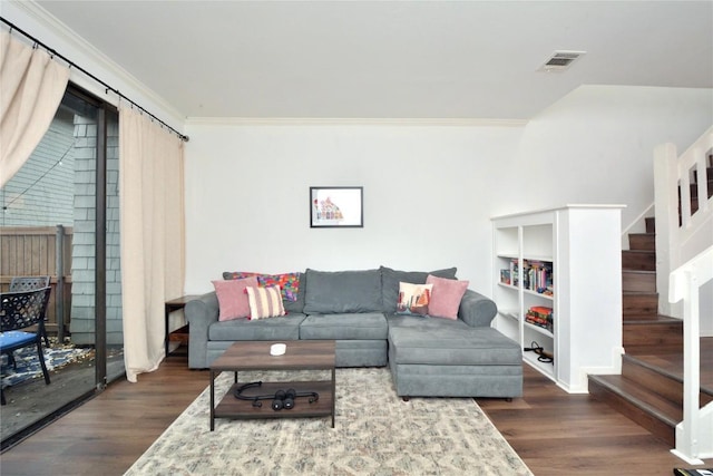 7122 Woodhollow Dr Unit 105, Austin, TX 78731 - living room with wood finished floors, stairs, and crown molding