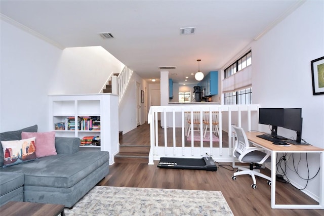 7122 Woodhollow Dr Unit 105, Austin, TX 78731 - home office with wood finished floors and ornamental molding