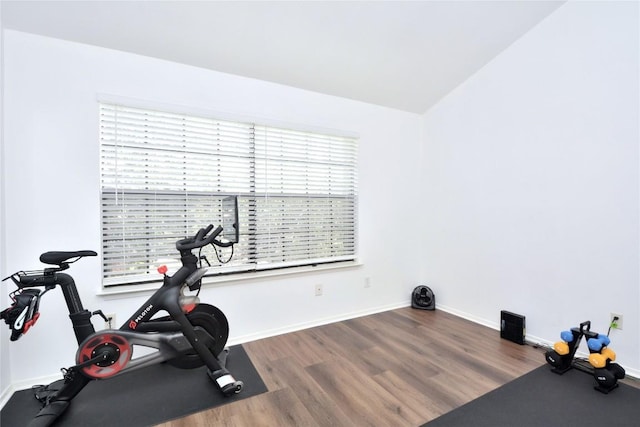 7122 Woodhollow Dr Unit 105, Austin, TX 78731 - exercise room featuring wood finished floors and baseboards
