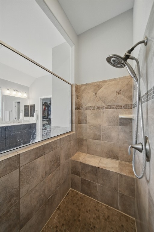 4121 Vinalopo Dr, Austin, TX 78738 - full bath featuring a tile shower and vanity