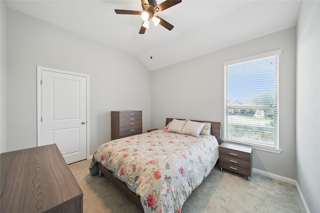 4121 Vinalopo Dr, Austin, TX 78738 - bedroom with light colored carpet, vaulted ceiling, and ceiling fan