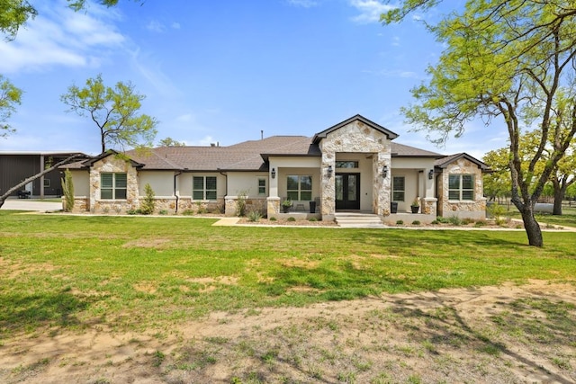 10900 Ranch Road 1323, Johnson City, TX 78636 - view of front of property featuring stone siding, stucco siding, and a front yard