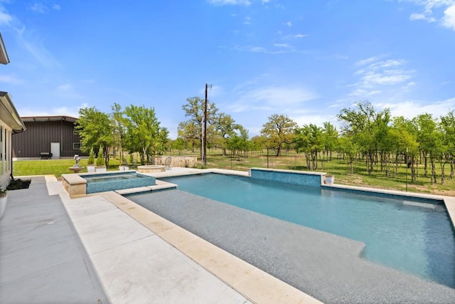 10900 Ranch Road 1323, Johnson City, TX 78636 - view of swimming pool with a patio and a pool with connected hot tub
