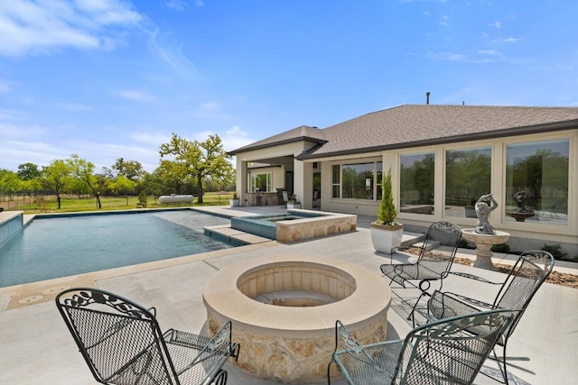 10900 Ranch Road 1323, Johnson City, TX 78636 - view of pool with an outdoor fire pit, a patio, and a pool with connected hot tub