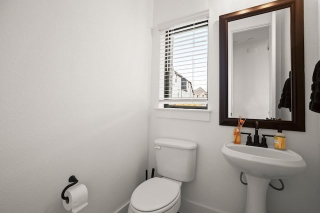 1244 Calendula Trl, Georgetown, TX 78628 - half bath featuring toilet and baseboards