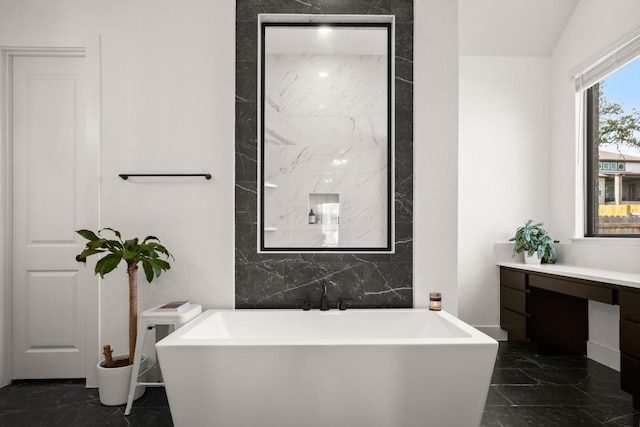 1244 Calendula Trl, Georgetown, TX 78628 - full bathroom featuring a freestanding bath, marble finish flooring, and vanity