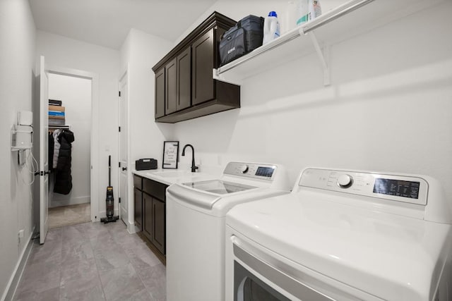 1244 Calendula Trl, Georgetown, TX 78628 - washroom with cabinet space, washing machine and dryer, and baseboards