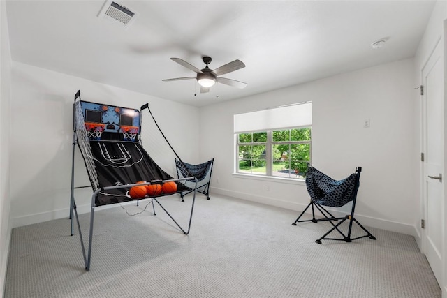 417 Wichita St, Meadowlakes, TX 78654 - sitting room with carpet floors, baseboards, and a ceiling fan