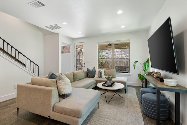 417 Wichita St, Meadowlakes, TX 78654 - living room featuring baseboards, recessed lighting, wood finished floors, and stairway