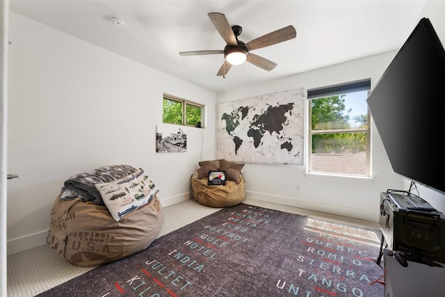 417 Wichita St, Meadowlakes, TX 78654 - living area featuring healthy amount of natural light, a ceiling fan, and baseboards
