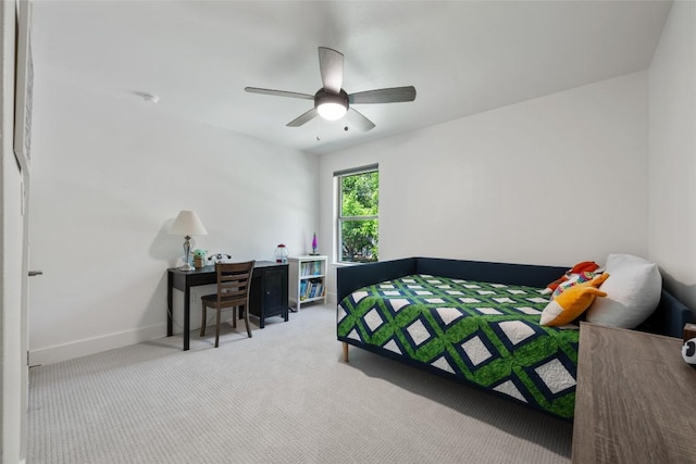 417 Wichita St, Meadowlakes, TX 78654 - carpeted bedroom featuring baseboards and ceiling fan