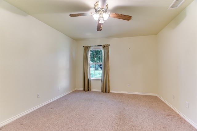 104 Springfield, Horseshoe Bay, TX 78657 - spare room featuring light carpet, ceiling fan, and baseboards