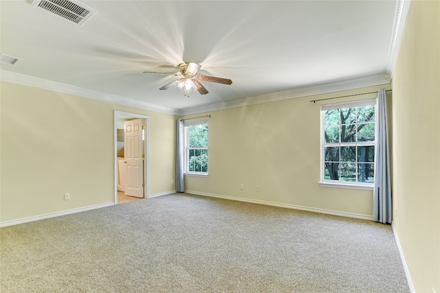 104 Springfield, Horseshoe Bay, TX 78657 - carpeted empty room with crown molding, baseboards, and ceiling fan