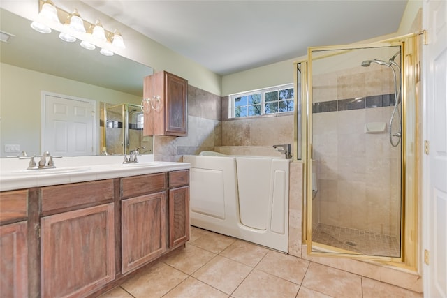 104 Springfield, Horseshoe Bay, TX 78657 - bathroom featuring tile patterned floors, a garden tub, a stall shower, and double vanity