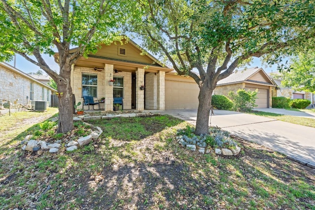 11505 Buster Crabbe Dr, Austin, TX 78748 - view of front of house with an attached garage, ceiling fan, concrete driveway, cooling unit, and a porch