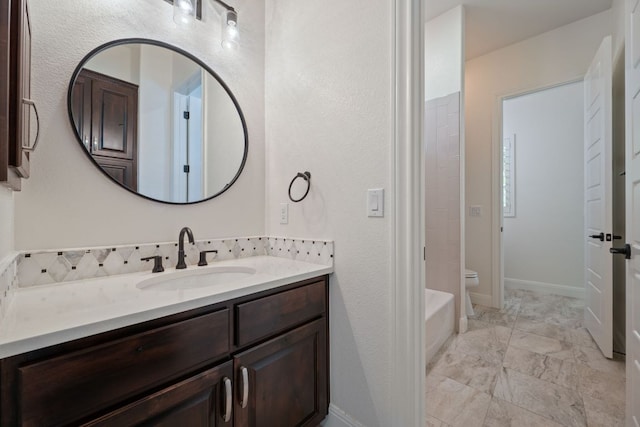 106 Gabriel Woods Dr, Georgetown, TX 78633 - bathroom featuring vanity, marble finish floors, and shower / bathtub combination