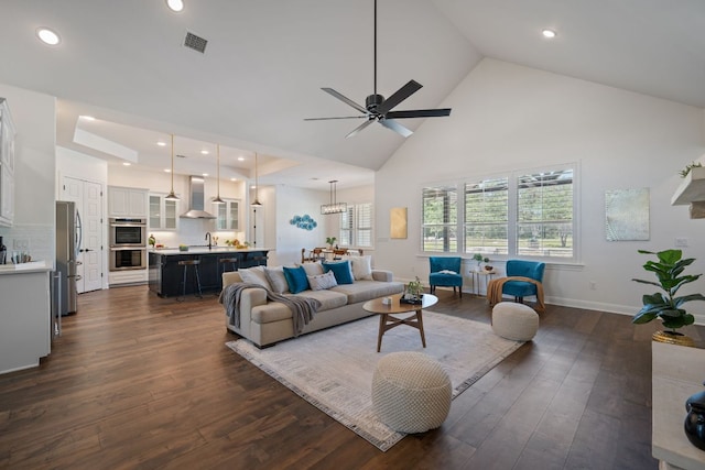106 Gabriel Woods Dr, Georgetown, TX 78633 - living room featuring a ceiling fan, high vaulted ceiling, dark wood-style floors, and recessed lighting