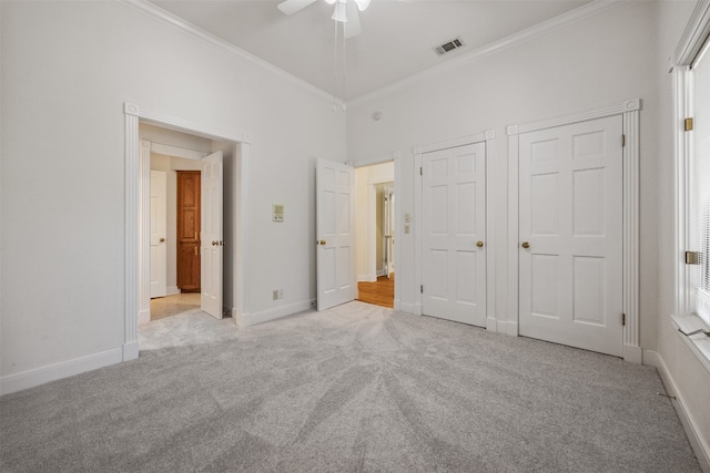 10242 Pinehurst Dr, Austin, TX 78747 - unfurnished bedroom featuring carpet floors, crown molding, baseboards, ceiling fan, and a high ceiling