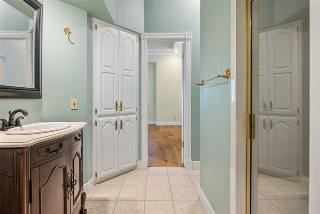 10242 Pinehurst Dr, Austin, TX 78747 - bathroom featuring vanity and tile patterned floors