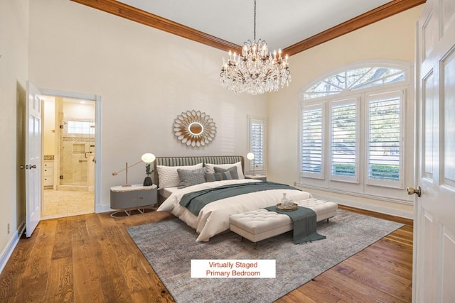 10242 Pinehurst Dr, Austin, TX 78747 - bedroom featuring ornamental molding, wood finished floors, a chandelier, baseboards, and a high ceiling