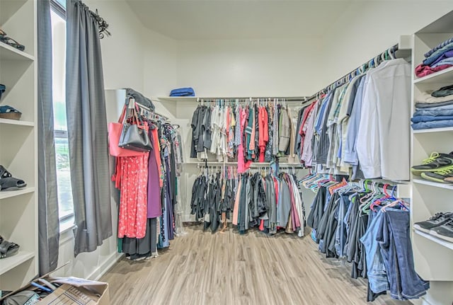 171 Eely Rd, Mcdade, TX 78650 - walk in closet featuring wood finished floors