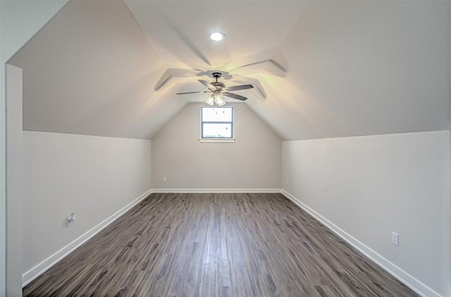 171 Eely Rd, Mcdade, TX 78650 - bonus room featuring a ceiling fan, dark wood-style flooring, baseboards, and vaulted ceiling