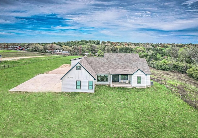 171 Eely Rd, Mcdade, TX 78650 - view of front of property with a patio and board and batten siding