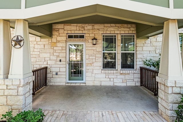 2930 Grand Oaks Loop Unit 401, Cedar Park, TX 78613 - view of exterior entry with a porch and stone siding