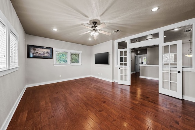 2930 Grand Oaks Loop Unit 401, Cedar Park, TX 78613 - empty room with french doors, wood-type flooring, ceiling fan, baseboards, and recessed lighting