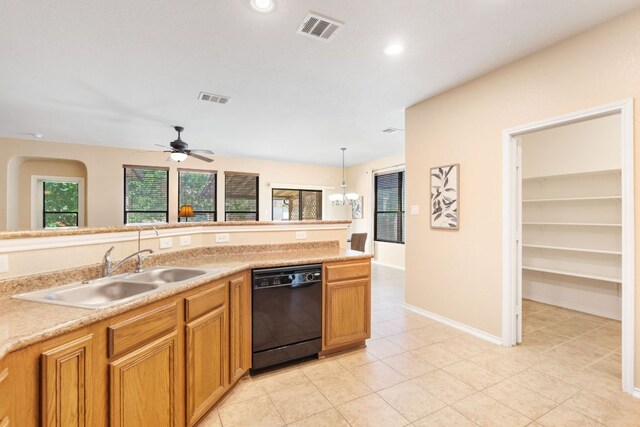 366 Matthews Ln, Kyle, TX 78640 - kitchen featuring black dishwasher, light countertops, recessed lighting, decorative light fixtures, and a ceiling fan