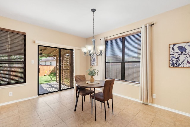 366 Matthews Ln, Kyle, TX 78640 - dining room featuring a chandelier and light tile patterned flooring