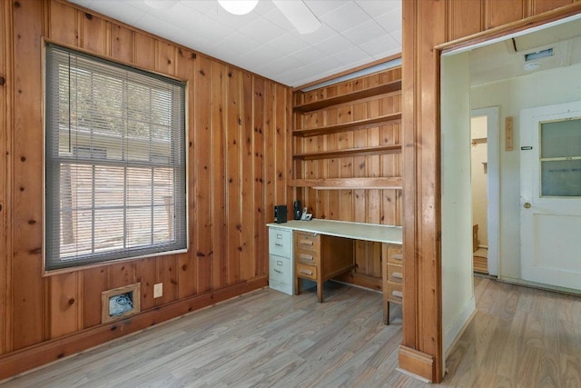 6009 Belfast Dr, Austin, TX 78723 - unfurnished office featuring wooden walls and light wood finished floors