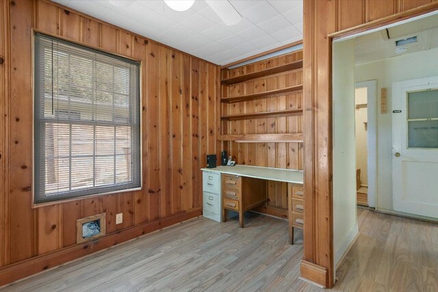 6009 Belfast Dr, Austin, TX 78723 - unfurnished office featuring wooden walls and light wood finished floors